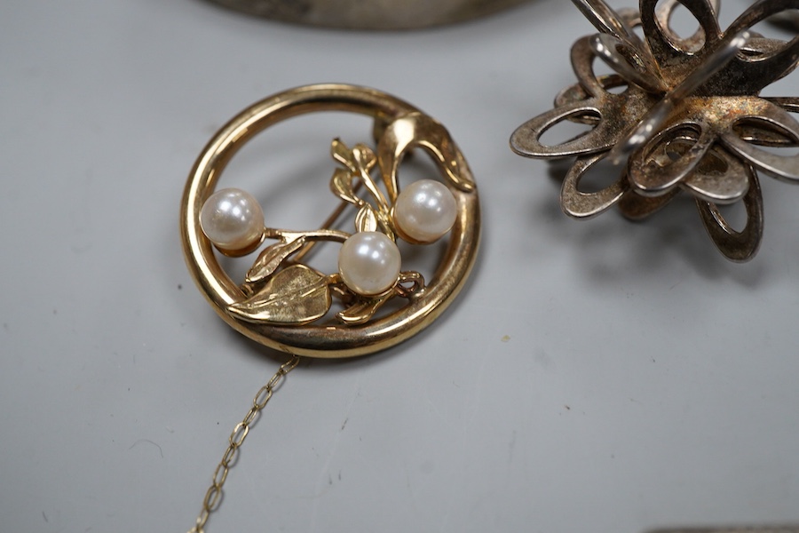 A collection of silver jewels, comprising: a bangle; a chain necklace suspending two winding toothpicks, one with toothpick deficient; a rope twist chain; a pair of cufflinks with the initials DBH; a pendant of abstract